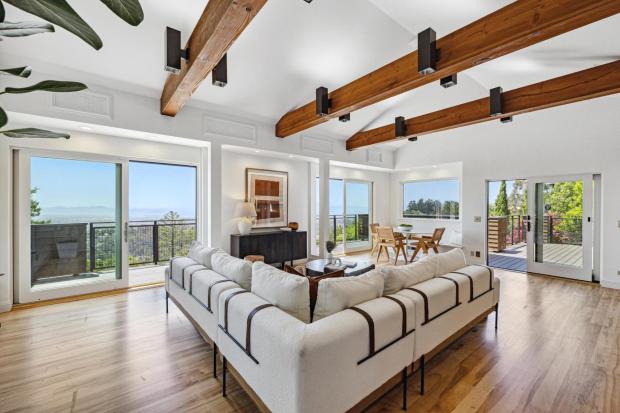 Living room with patio overlooking bay.