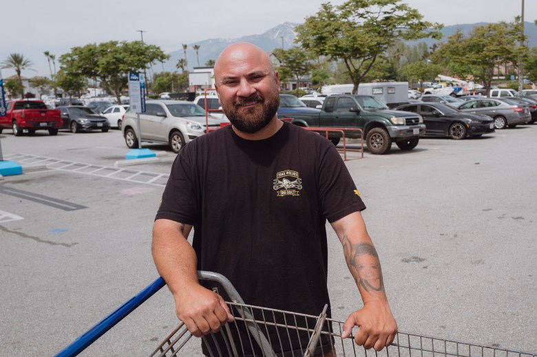 Jose Rodriguez at the Lowe's parking lot in Fontana on April 18, 2024. Rodriguez, an electrician and resident of San Bernardino County, supports the effort to have the county secede from the state of California. Photo by Zaydee Sanchez for CalMatters