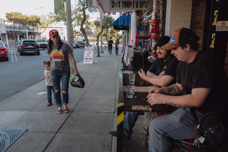 People in downtown Upland on April 18, 2024. Photo by Zaydee Sanchez for CalMatters