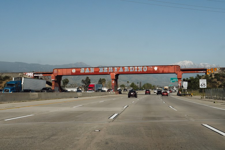 An overpass with "San Bernardino" painted on it on Interstate 210 on April 18, 2024. Photo by Zaydee Sanchez for CalMatters