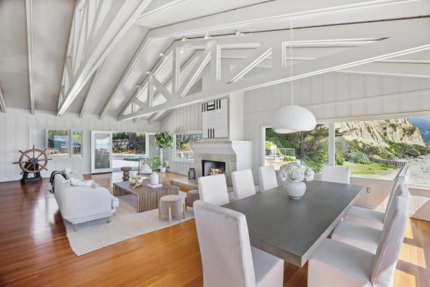 Living room with exposed beams.