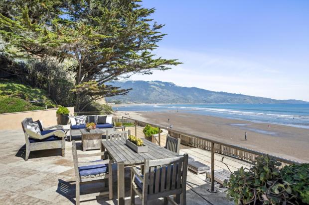 Patio overlooking crashing waves.