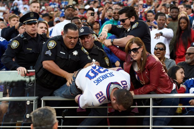 Santa Clara Police officers arrest a New York Giants fan during the fourth quarter of their NFL game at Levi's Stadium in Santa Clara, Calif., on Sunday, Nov. 12, 2017. A woman who was with the fan was also arrested when she interfered with police. (Jose Carlos Fajardo/Bay Area News Group)