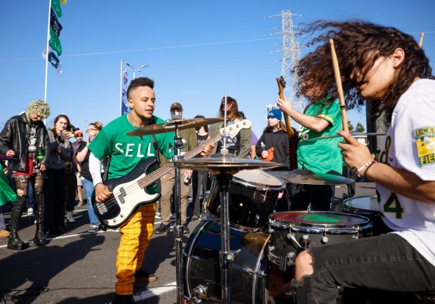 The band, Aggravated Assault's bassist Ajay Moore and drummer Kevin Hernandez play during a reverse boycott in the parking lot at the Coliseum in Oakland, Calif., Friday, June 7, 2024. (Shae Hammond/Bay Area News Group)