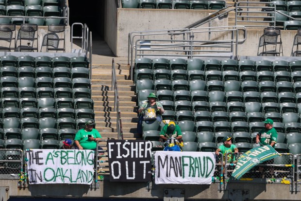 Oakland Athletics fans in the upper deck of the right field, display banners in discontent with A's owner John Fisher moving the team to Las Vegas, during a game against the Kansas City Royals at the Coliseum in Oakland, Calif., on Wednesday, Aug. 23, 2023. (Ray Chavez/Bay Area News Group)