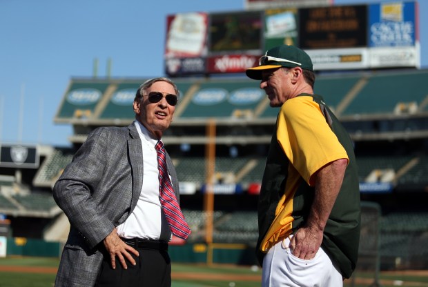 Major League Baseball commissioner Allan "Bud" Selig, left, talks to Oakland Athletics manager Bob Melvin during Selig's visit prior to the Athletics and the New York Mets game at O.co Coliseum in Oakland, Calif., on Tuesday, Aug. 19, 2014. Selig is visiting the Bay Area as part of his final-year tour of MLB stadiums. (Ray Chavez/Bay Area News Group)