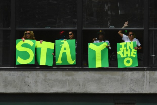 Oakland Athletics fans display a sign asking them to stay in Oakland while playing the Los Angeles Angels in the seventh inning of their MLB game at the Coliseum in Oakland, Calif., on Saturday, May 29, 2021. On Friday, April 20, 2023, Dave Kaval announced that the A's finalized a deal last week to buy a 49-acre site near the Vegas Strip, where they plan to construct a $1.5 billion, 35,000-seat stadium. (Jose Carlos Fajardo/Bay Area News Group)