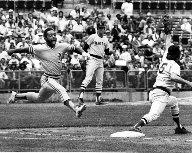 Oakland A's outfielder Billy North leaps toward first base against the Boston Red Sox. (1973 photo by Ron Riesterer/photoshelter)