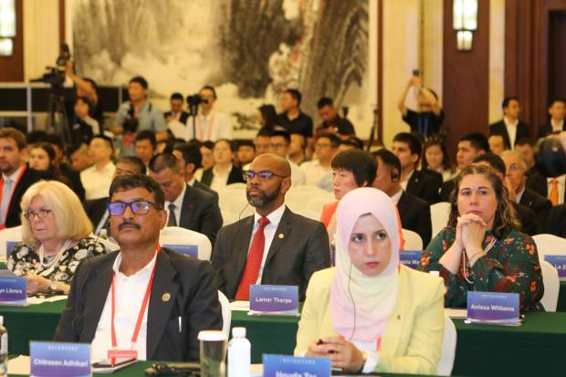 Antioch Mayor Lamar Hernandez-Thorpe (middle, second row) and Oakley Mayor Anissa Williams (middle right) participate in a mayors' conference at the Chongquing International Expo in China on Wednesday, May 22, 2024. A group of Bay Area mayors is visiting China as part of a trip hosted by China Silicon Valley, a nonprofit.