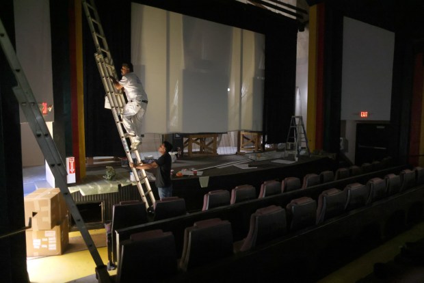 Painters work inside the Delta Theater on Wednesday, May 8, 2024, in Brentwood, Calif. The two screen theater is undergoing renovations and is scheduled to open Memorial Day weekend. (Aric Crabb/Bay Area News Group)