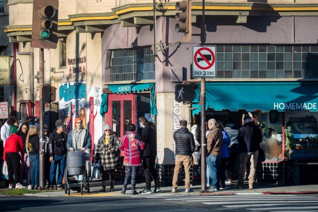 Patrons of the popular Berkeley restaurant Homemade Cafe wait for their final visit, Monday, Jan. 1, 2024, as the owner has announced it will be closing for good today. (Karl Mondon/Bay Area News Group)