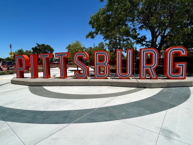 As part of a Railroad Avenue beautification project, construction workers for the city of Pittsburg completed installing a giant block-letter sign spelling the city's name on June 3, 2024. The sign was funded through grant monies as was the pocket park being built at the site on Railroad Avenue a block from Pittsburg High School (Zuna Barker Portillo/City of Pittsburg).