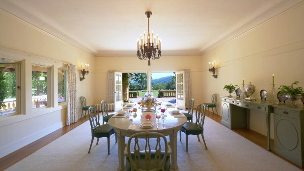 Chandelier over dining room table.