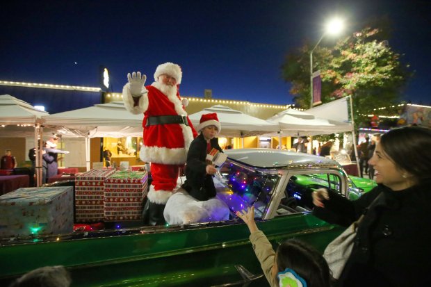 Santa arrives during the Montclair Holiday Stroll on Thursday, Dec. 1, 2016, in Oakland, Calif. (Aric Crabb/Bay Area News Group)