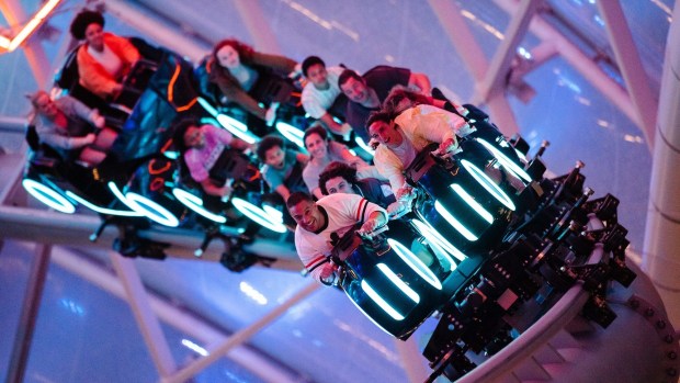 Guests ride the TRON Lightcycle / Run at Walt Disney World in Florida. (Courtesy of Disney)