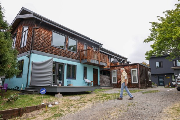 Mike Bradley, 83, walks towards his ADU his son Casey built in the same lot in Berkeley, Calif., on Friday, May 24, 2023. (Ray Chavez/Bay Area News Group)