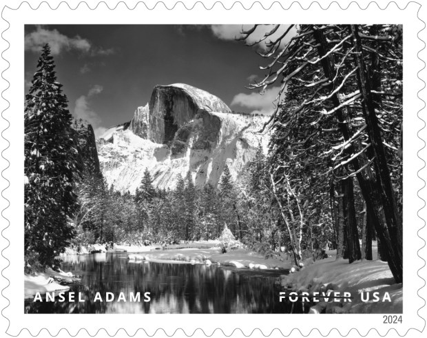 The U.S. Postal Service has unveiled 16 new stamps featuring the work of legendary Bay Area photographer Ansel Adams. This stamp features Half Dome, Merced River, Winter, Yosemite National Park, California (1938). The stamps will be issued starting Wednesday May 15, 2024 at a ceremony in Yosemite National Park, which Adams photographed over seven decades until his death in 1984. (Photo: U.S. Postal Service)