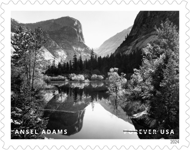 The U.S. Postal Service has unveiled 16 new stamps featuring the work of legendary Bay Area photographer Ansel Adams. This stamp features Mirror Lake, Mount Watkins, Spring, Yosemite National Park, California (1935). The stamps will be issued starting Wednesday May 15, 2024 at a ceremony in Yosemite National Park, which Adams photographed over seven decades until his death in 1984. (Photo: U.S. Postal Service)