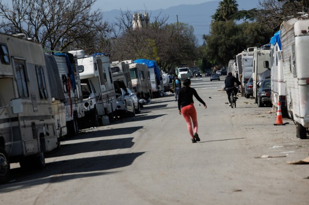 RVs and cars are parked at the homeless encampment near Columbus Park in San Jose, Calif., on Friday, April 12, 2024. (Dai Sugano/Bay Area News Group)