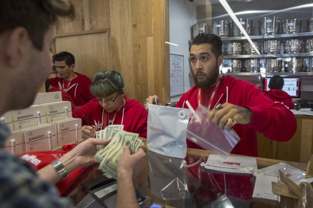 A customer buys cannabis products at MedMen, one of the two Los Angeles area pot shops that began selling marijuana for recreational use under the new California marijuana law today, on Jan. 2, 2018 in West Hollywood, California. Los Angeles and other nearby cities outside of West Hollywood have not finalized their local permitting rules so licenses to businesses in those jurisdictions are yet to be granted. (Photo by David McNew/Getty Images)