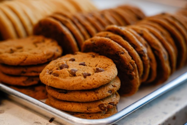 Chocolate chip cookies are stacked available for $23.95 a dozen at Pacific Cookie Company in Santa Cruz, Calif., on Friday, April 19, 2024. (Shae Hammond/Bay Area News Group)