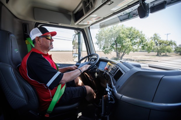 Performance Food Group delivery driver Duane Clark demonstrates driving an electric semi truck during a Performance Food Group's event, where they showcased their 6 electric semi trucks and electric refrigeration units on Monday, April 22, 2024, in Gilroy, Calif. (Dai Sugano/Bay Area News Group)