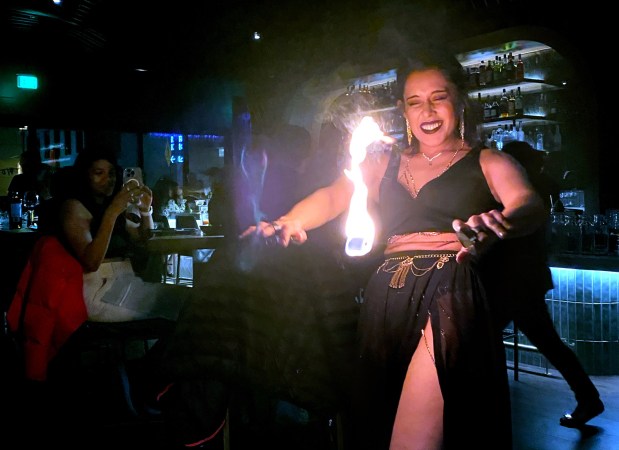 Fire dancers illuminate the Fitoor lounge on Friday and Saturday nights. (Linda Zavoral/Bay Area News Group)