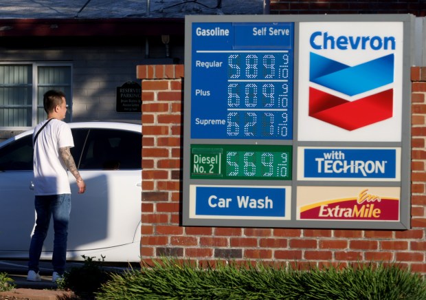 A motorist puts air in his tires at a Chevron gas station where prices are over $6 per gallon in Danville, Calif., on Wednesday, April 17, 2024. (Jane Tyska/Bay Area News Group)