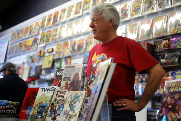 CONCORD, CALIFORNIA - NOVEMBER 16: Flying Color Comics owner Joe Field with a display of graphic novels at his shop on Wednesday, Nov. 16, 2022, in Concord, Calif.(Aric Crabb/Bay Area News Group)