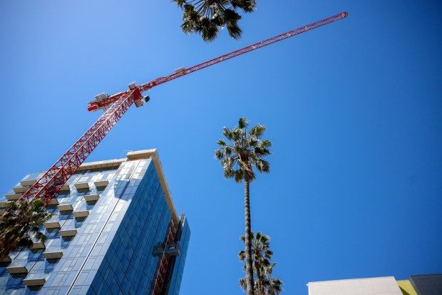 Construction work is done on a new building on South First St. and East Reed Street in downtown San Jose, Calif., on Thursday, May 16, 2024. (Shae Hammond/Bay Area News Group)