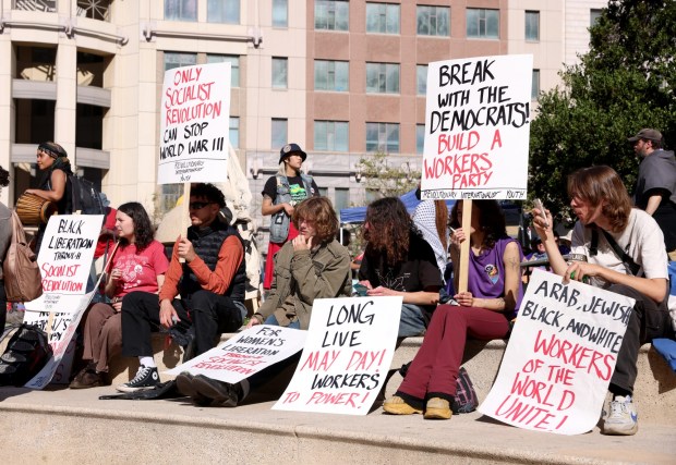 Pro-Palestinian protesters gather at a May Day rally at City Hall in downtown Oakland, Calif., on Wednesday, May 1, 2024. Multiple protests took place throughout the Bay Area as part of May Day action in support of workers and Palestinian people. (Jane Tyska/Bay Area News Group)