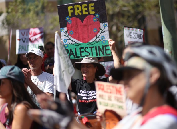 Protesters in front of the Ronald V. Dellums Federal Building for a May Day rally on Wednesday, May 1, 2024, in Oakland, Calif. (Aric Crabb/Bay Area News Group)