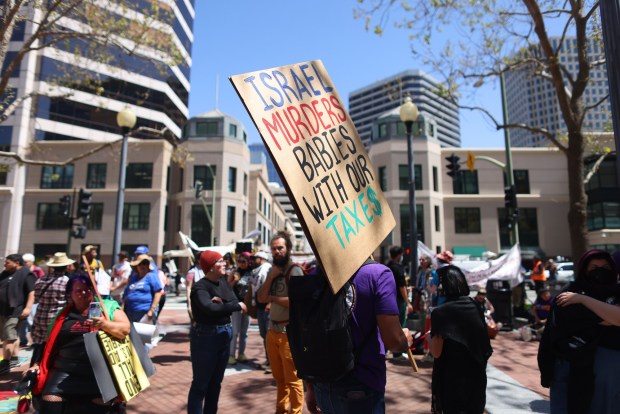 Protesters in front of the Ronald V. Dellums Federal Building for a May Day rally on Wednesday, May 1, 2024, in Oakland, Calif. (Aric Crabb/Bay Area News Group)