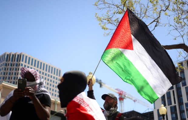 Protesters in front of the Ronald V. Dellums Federal Building for a May Day rally on Wednesday, May 1, 2024, in Oakland, Calif. (Aric Crabb/Bay Area News Group)