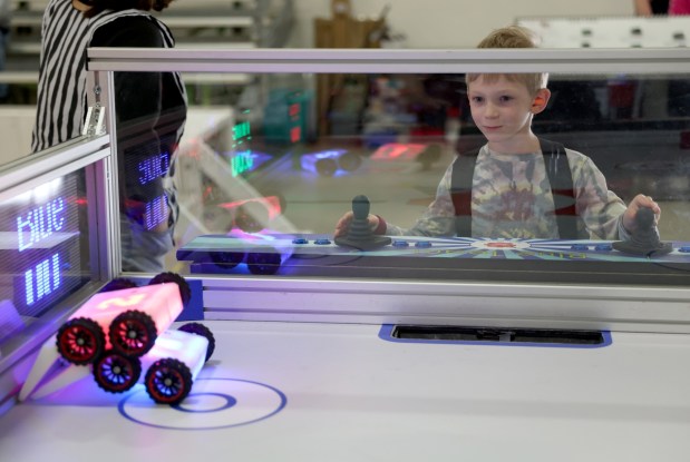 Connor Kaehms, 7, of Fremont, competes in a robotic hockey game during the RoboGames 2023 competition at the Alameda County Fairgrounds in Pleasanton, Calif., on Thursday, April 6, 2023. Both local and international participants competed in over 40 events at the 16th annual world championship. (Jane Tyska/Bay Area News Group)