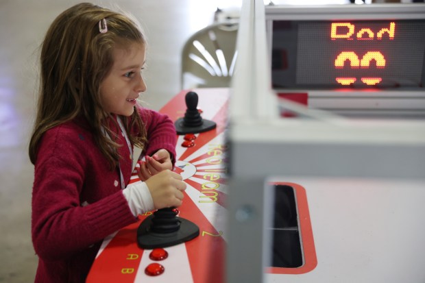 Alice Lanz, 5, of San Pablo, competes in a robotic hockey game during the RoboGames 2023 competition at the Alameda County Fairgrounds in Pleasanton, Calif., on Thursday, April 6, 2023. Both local and international participants competed in over 40 events at the 16th annual world championship. (Jane Tyska/Bay Area News Group)