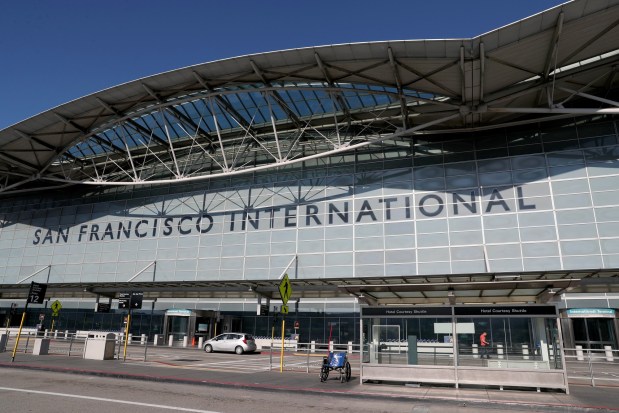 SAN FRANCISCO, CA - APRIL 07: A lone car and wheelchair are seen at San Francisco International Airport in San Francisco, Calif., on Tuesday, April 7, 2020. Air traffic was practically at a standstill due to the coronavirus pandemic. (Jane Tyska/Bay Area News Group)