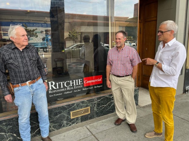 Ritchie Asset Management Co. executives (left to right) Chris Hygelund, co-founder and retiring partner; Chris Hagen, new partner and chief executive officer; and Mark Ritchie, company co-founder and partner, talk outside 34 West Santa Clara Street in downtown San Jose, the headquarters of Ritchie Commercial, a real estate firm.Image capture: 6-3-2024, San Jose, CA. (George Avalos/Bay Area News Group)