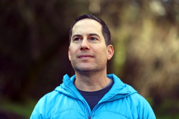 Ron Schneidermann the CEO of AllTrails stands along a trail in the Las Trampas Wilderness Regional Preserve on Tuesday, Feb. 6, 2024, in Alamo, Calif. AllTrails is a trail navigation application. (Aric Crabb/Bay Area News Group)