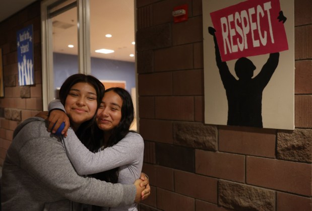 Diane Estino, 16, and Amy Ibarra, 15, hug at the Youth Empowerment for Success program at Washington United Youth Center, Tuesday, Oct. 17, 2023 in San Jose, Calif. The two met and became best friends at the program, one of the many run by Catholic Charities of Santa Clara County. (Karl Mondon/Bay Area News Group)