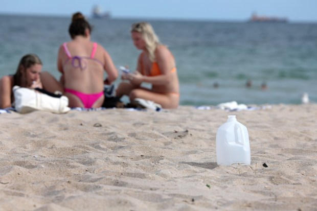 Things left behind by spring breakers after a day of partying on Fort Lauderdale beach on Thursday, March 14, 2024. Plastic is ubiquitous in 21st century life, yet it's polluting land, ocean and now our bodies. (Carline Jean/South Florida Sun Sentinel)